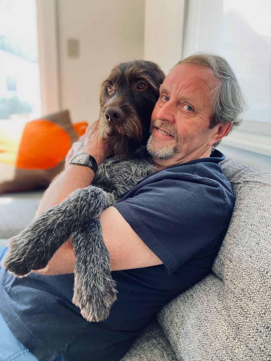 Murray Horne with Griffin, a Wirehaired Pointing Griffon